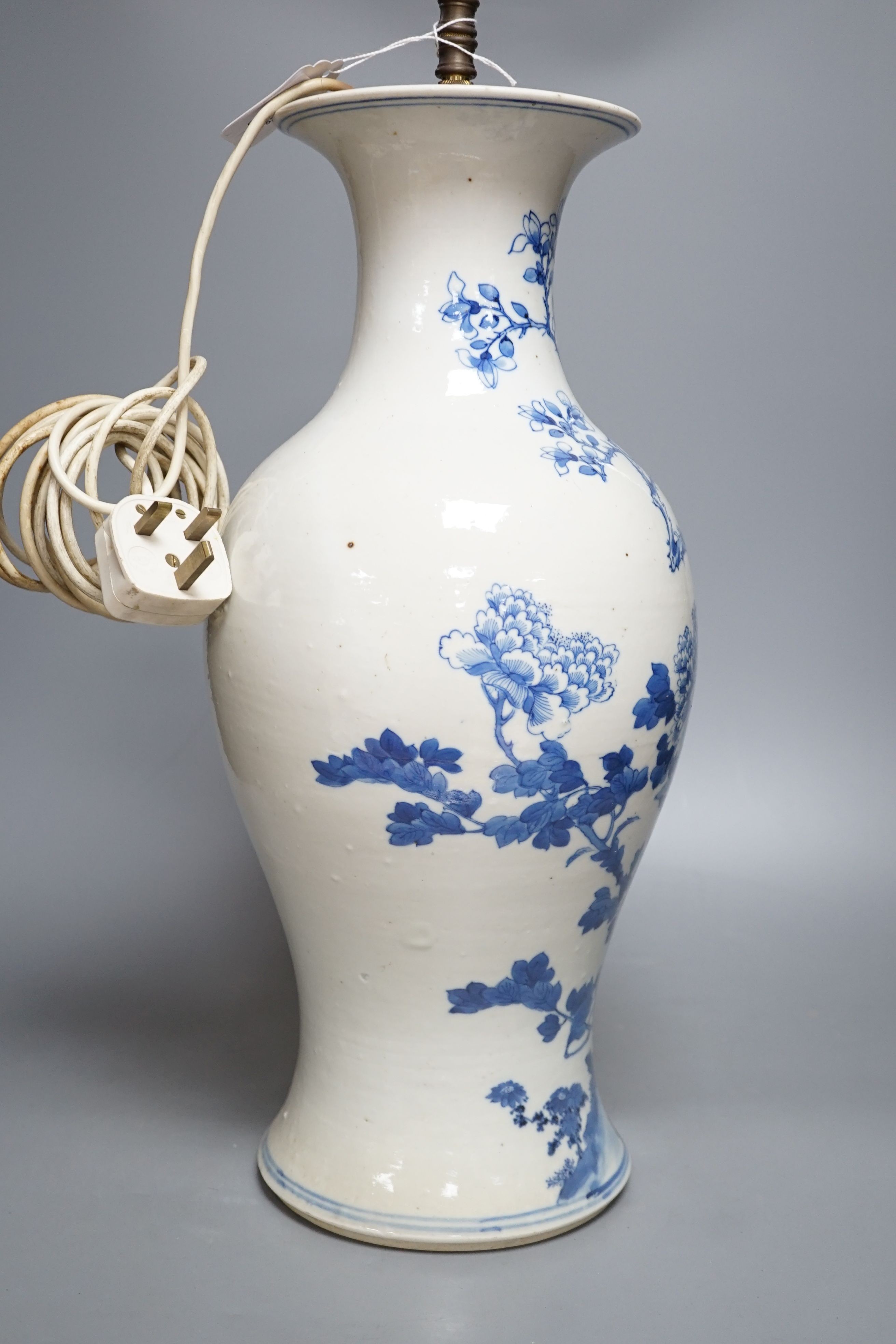 A 19th century Chinese blue and white ‘pheasant and rockwork’ baluster vase, converted to a lamp, total height 58cm